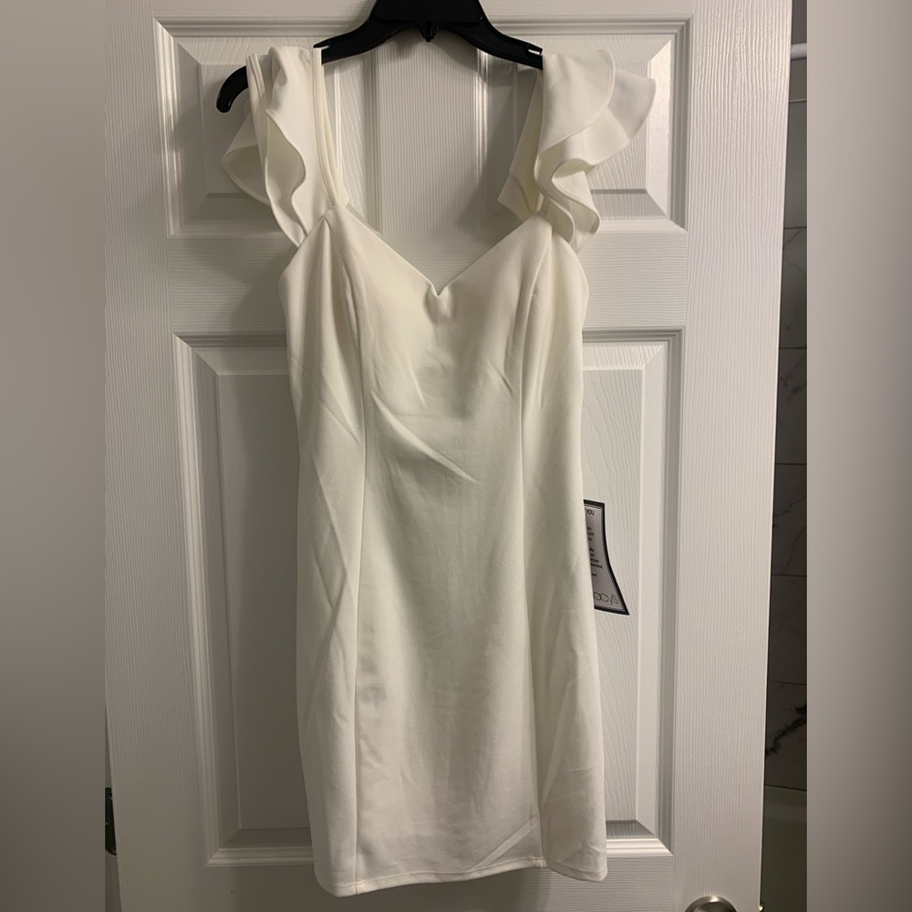 White mini cross back with flutter sleeves